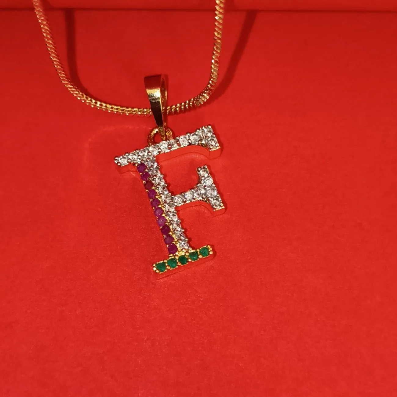 Nimoraa F Initial Gold Plated Pendant Chain with Red & Green Stones