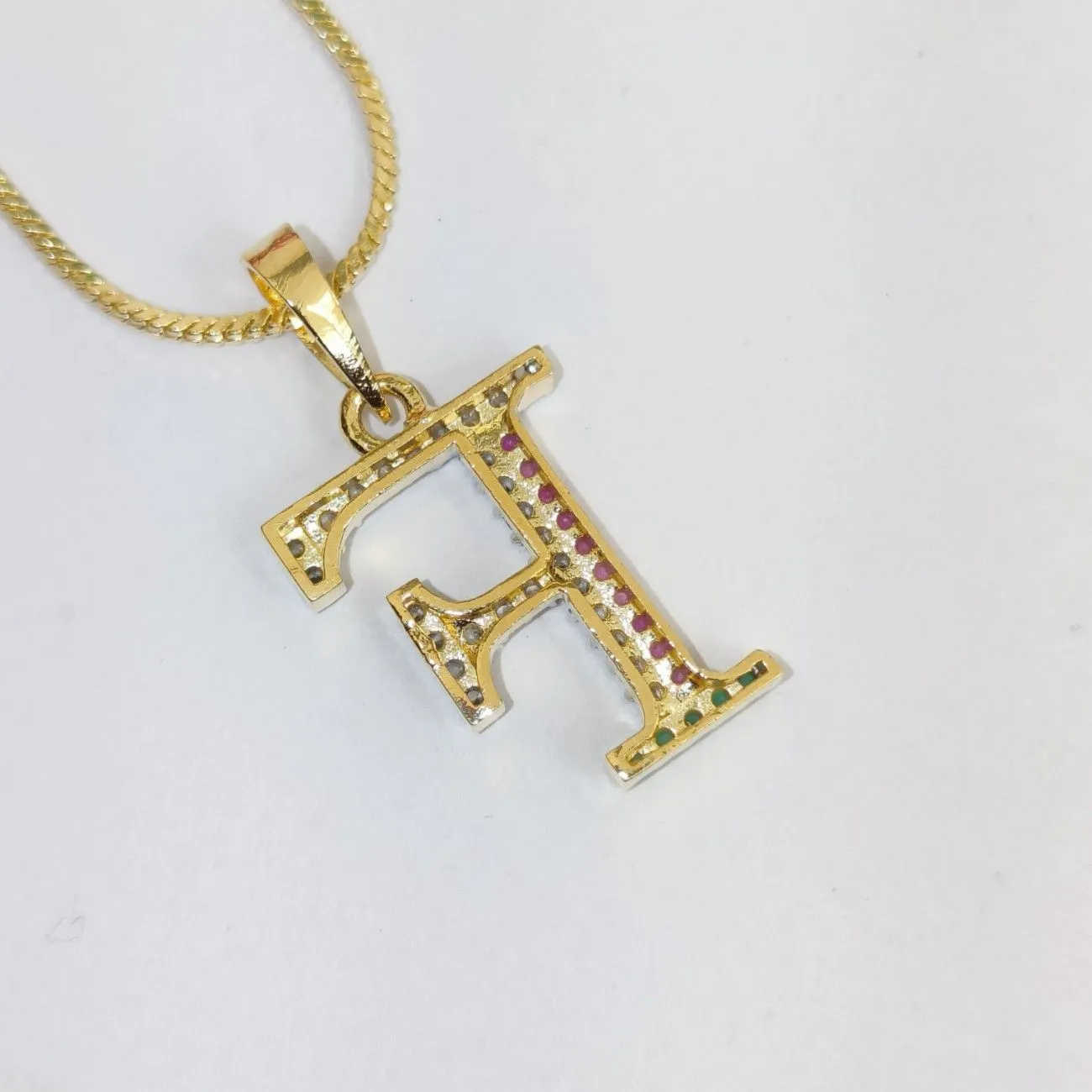 Nimoraa F Initial Gold Plated Pendant Chain with Red & Green Stones
