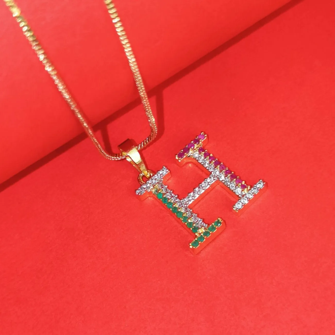 Nimoraa H Initial Gold Plated Pendant Chain with Red & Green Stones