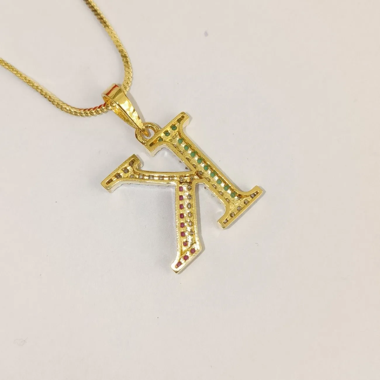 Nimoraa K Initial Gold Plated Pendant Chain with Red & Green Stones