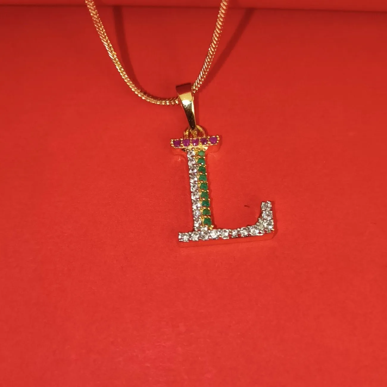 Nimoraa L Initial Gold Plated Pendant Chain with Red & Green Stones