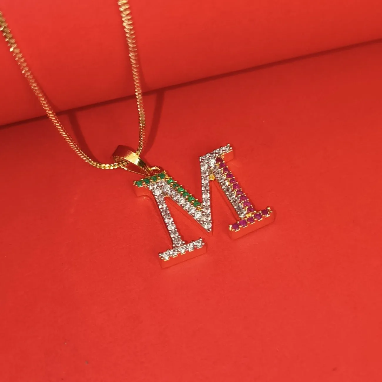 Nimoraa M Initial Gold Plated Pendant Chain with Red & Green Stones