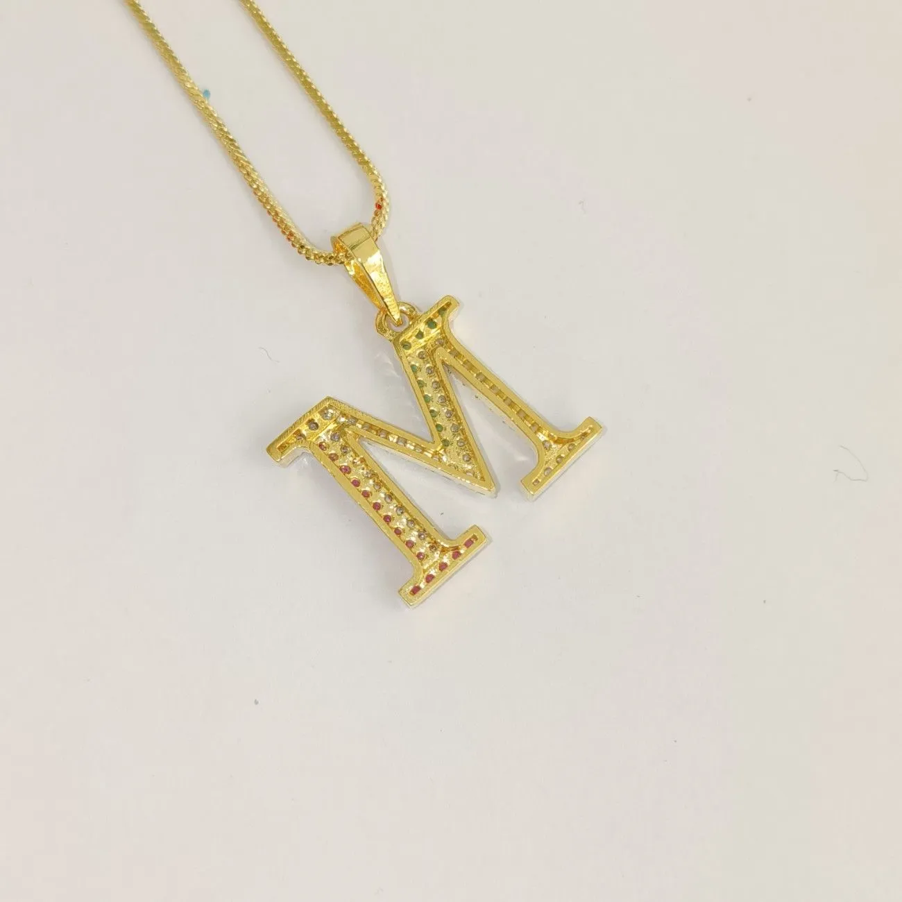 Nimoraa M Initial Gold Plated Pendant Chain with Red & Green Stones