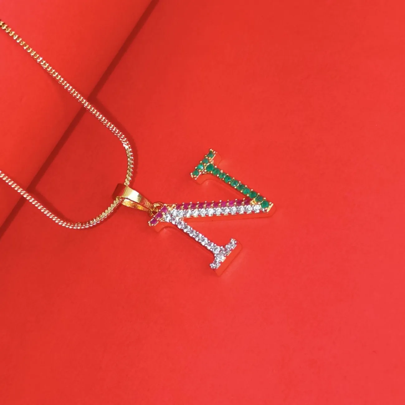 Nimoraa N Initial Gold Plated Pendant Chain with Red & Green Stones
