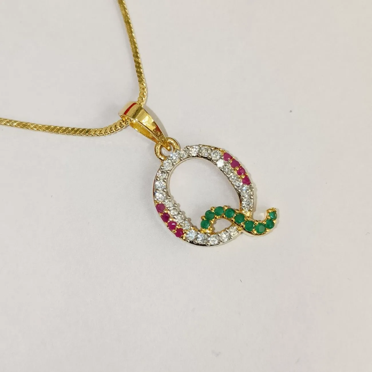 Nimoraa Q Initial Gold Plated Pendant Chain with Red & Green Stones