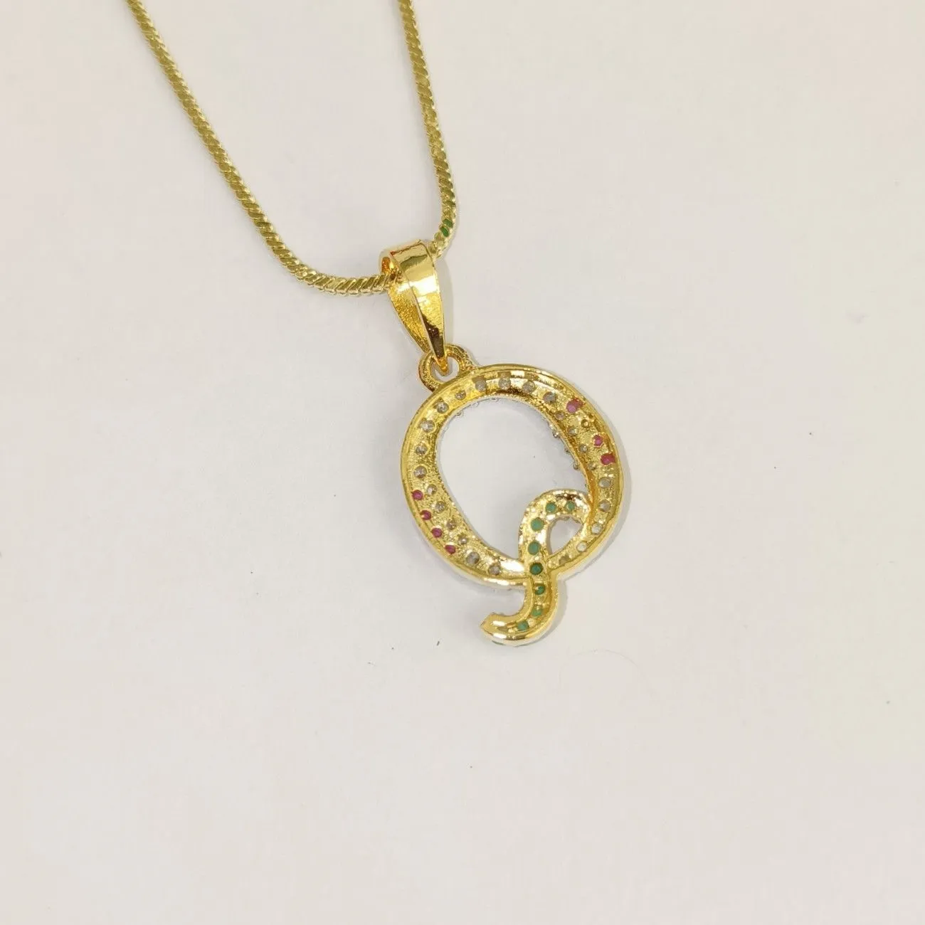 Nimoraa Q Initial Gold Plated Pendant Chain with Red & Green Stones