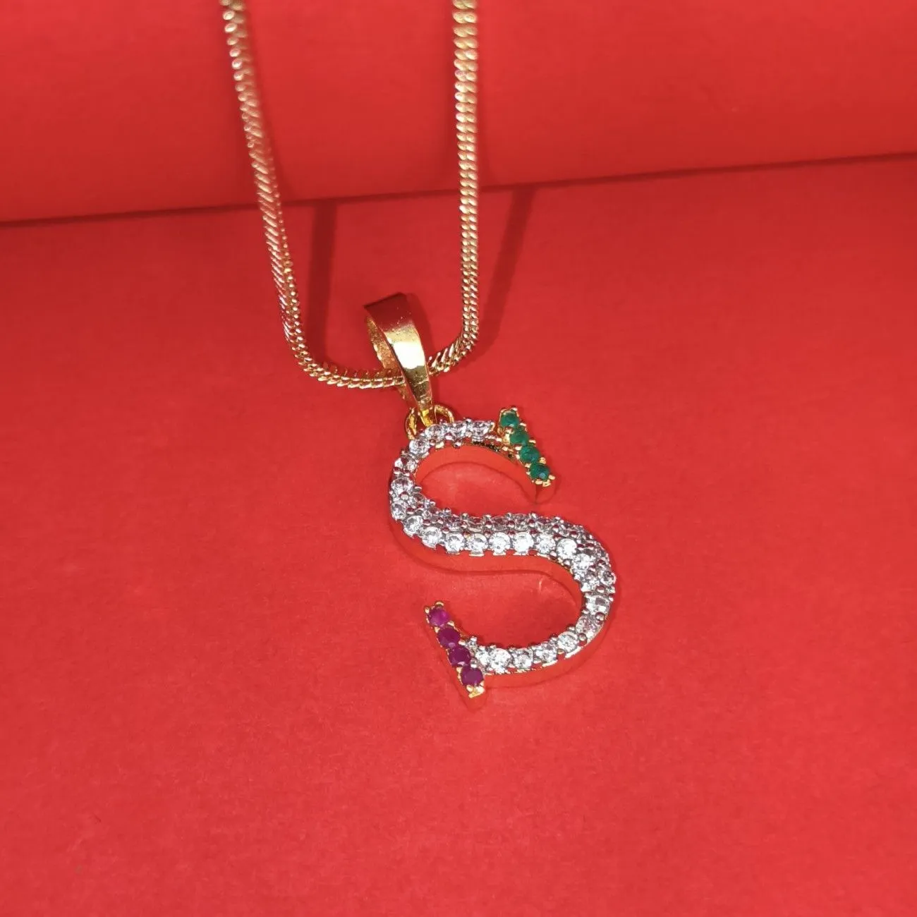 Nimoraa S Initial Gold Plated Pendant Chain with Red & Green Stones