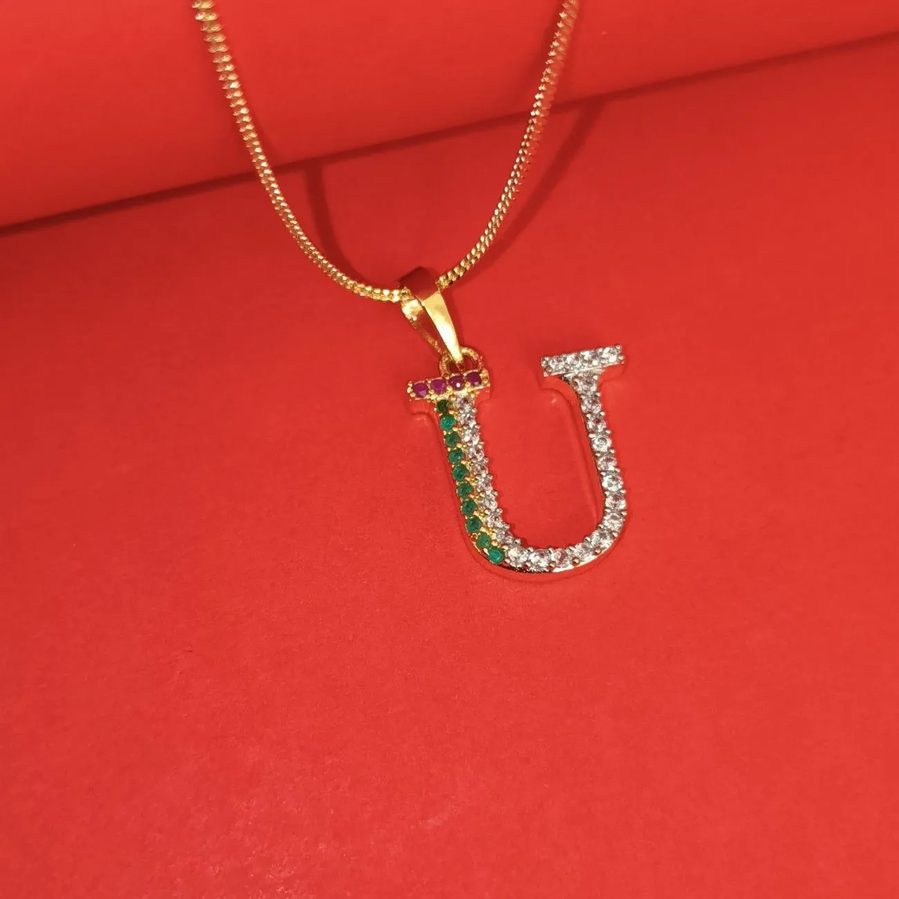 Nimoraa U Initial Gold Plated Pendant Chain with Red & Green Stones