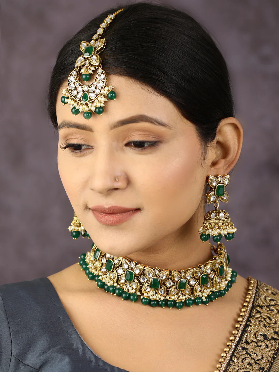 Nimoraa Royal Emerald Kundan Bridal Choker Necklace Set with Maangtikka & Jhumka Earrings