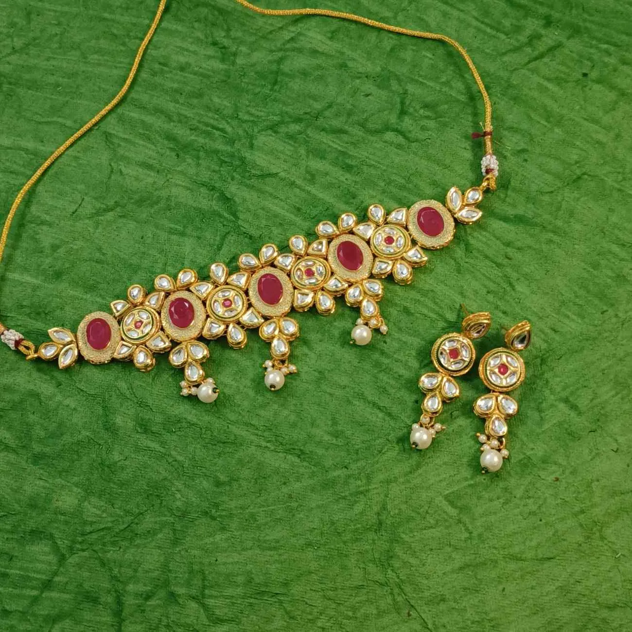 Nimoraa Gold Plated Kundan & Ruby Studded Navy Blue Choker Jewellery Set
