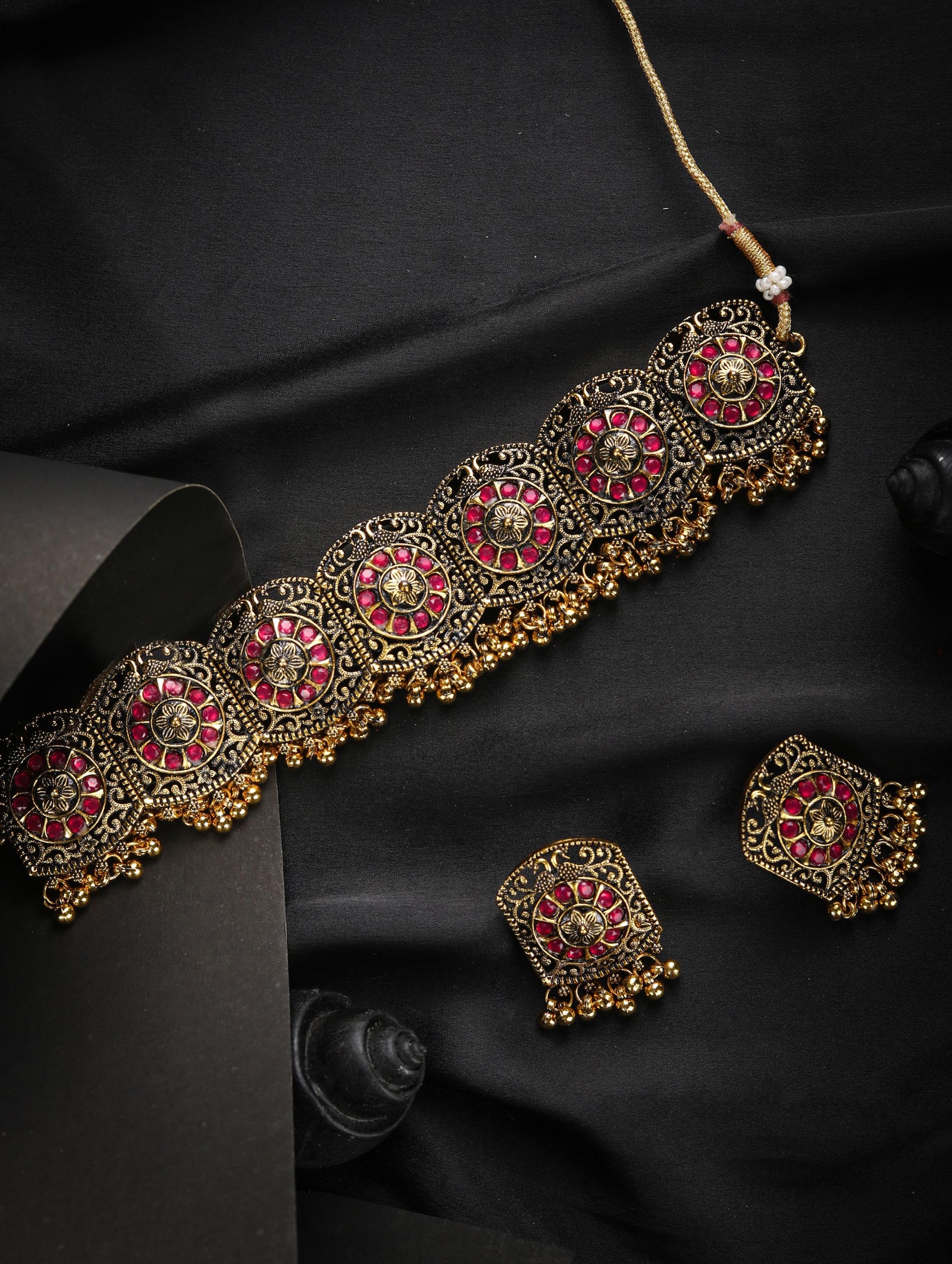 Nimoraa Antique Gold Plated Ruby Temple Choker Set with Heritage Motif Design