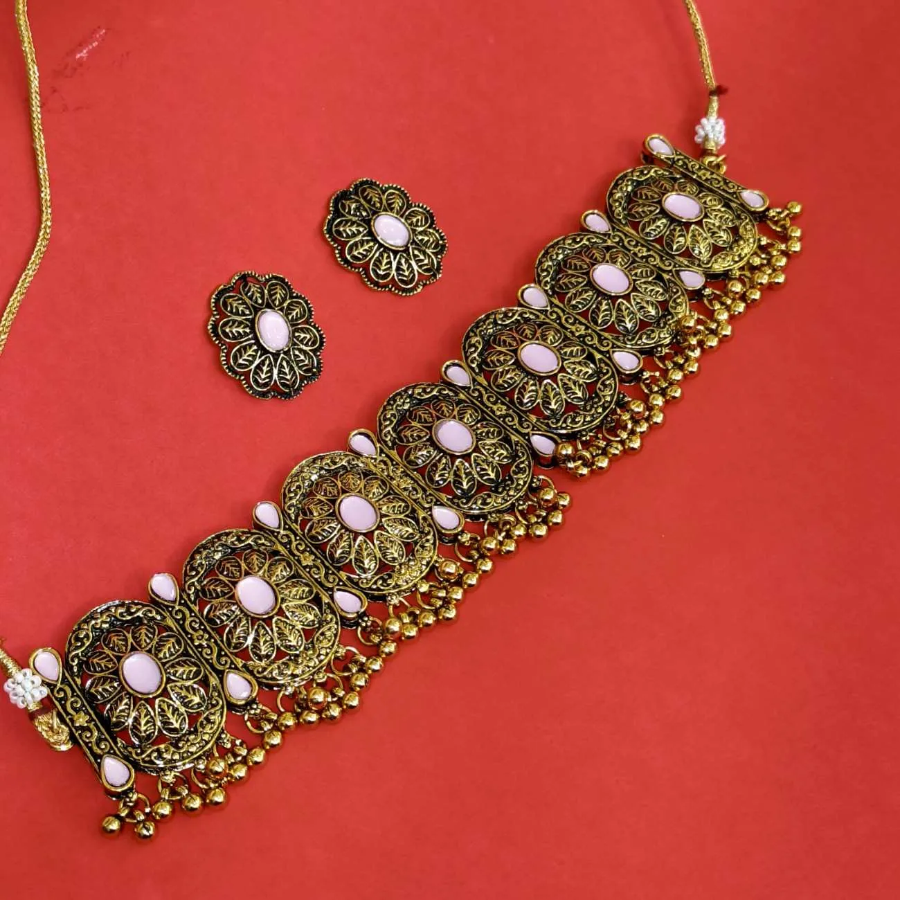 Nimoraa Antique Gold Plated Pink Stone Floral Choker Set with Heritage Detailing
