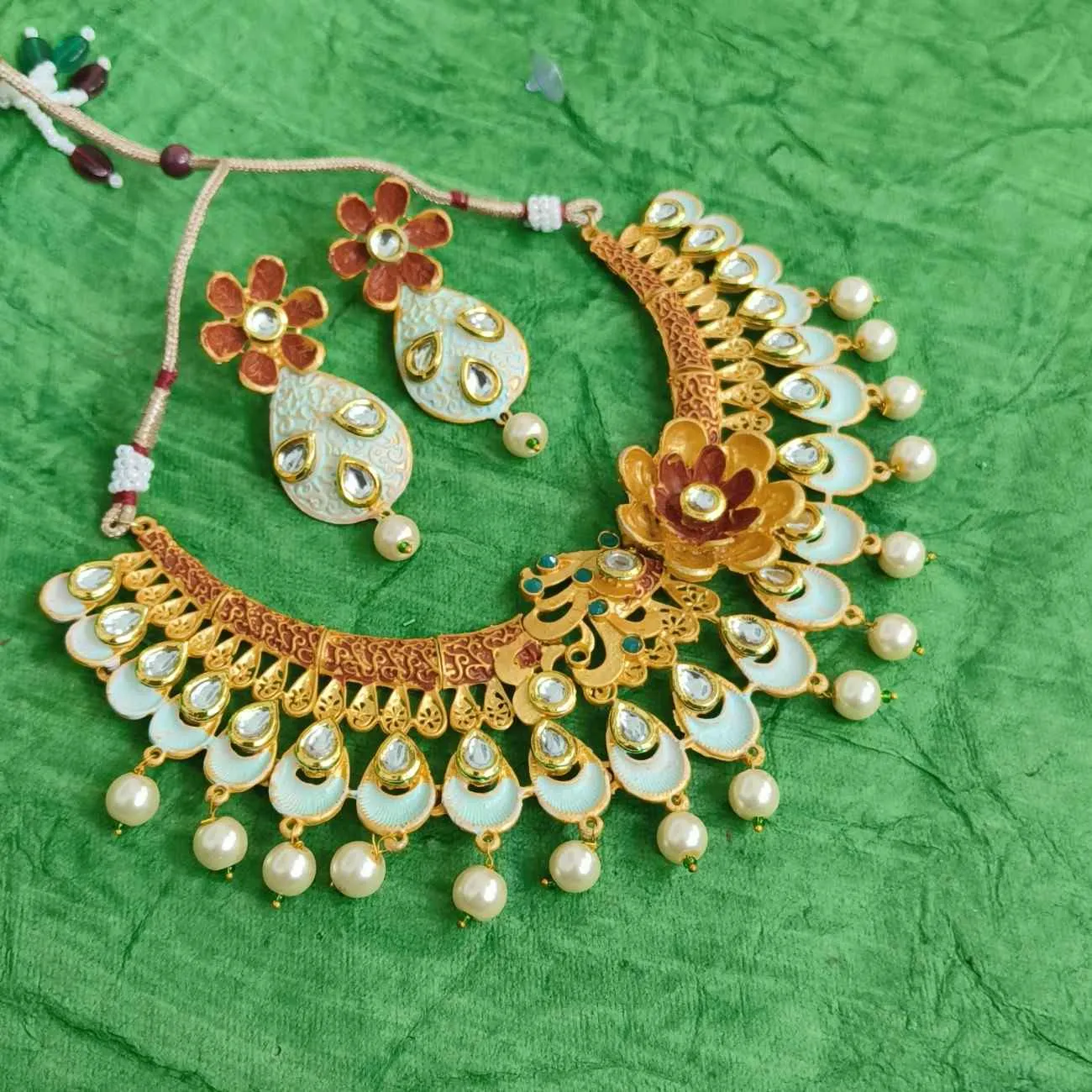 Pastel Color Kundan Pearls Gold Plated Floral Peacock Necklace Set
