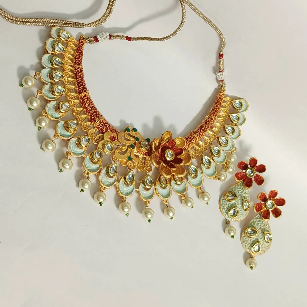 Pastel Color Kundan Pearls Gold Plated Floral Peacock Necklace Set