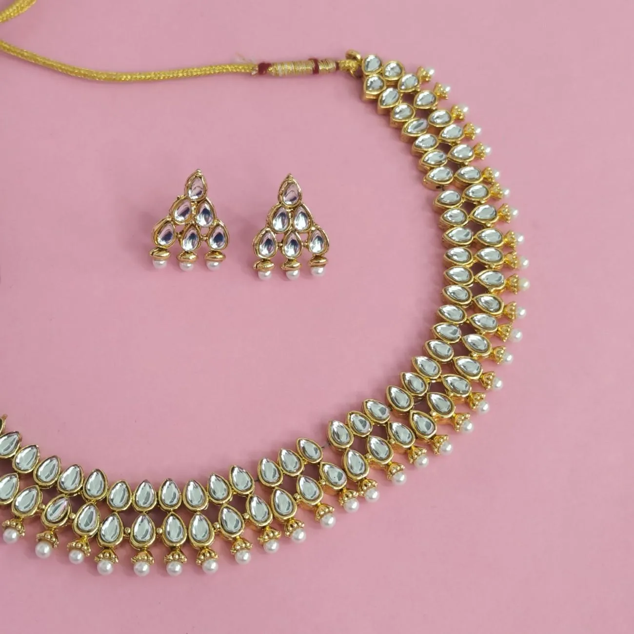 The Delicate Double Line Kundan Pearl Set